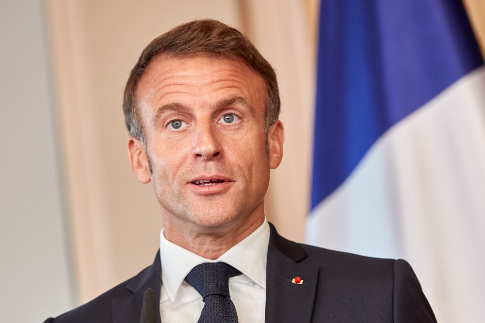 HAMBURG, GERMANY - OCTOBER 10: French President Emmanuel Macron speaks to the media during a press conference on the second day of a two-day German-French government retreat on October 10, 2023 in Hamburg, Germany. High on the agenda for the retreat are common policies regarding migration, energy and defense.  (Photo by Georg Wendt/Getty Images)