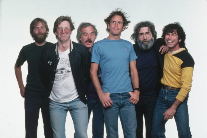 Members of the Grateful Dead are Phil Lesh (white T-shirt), Bob Weir (blue shirt), Mickey Hart (yellow shirt), Jerry Garcia (long hair and beard), Bill Kreutzmann (mustache) and Brent Mydland (black shirt and pants).  (Photo by © Roger Ressmeyer/CORBIS/VCG via Getty Images)